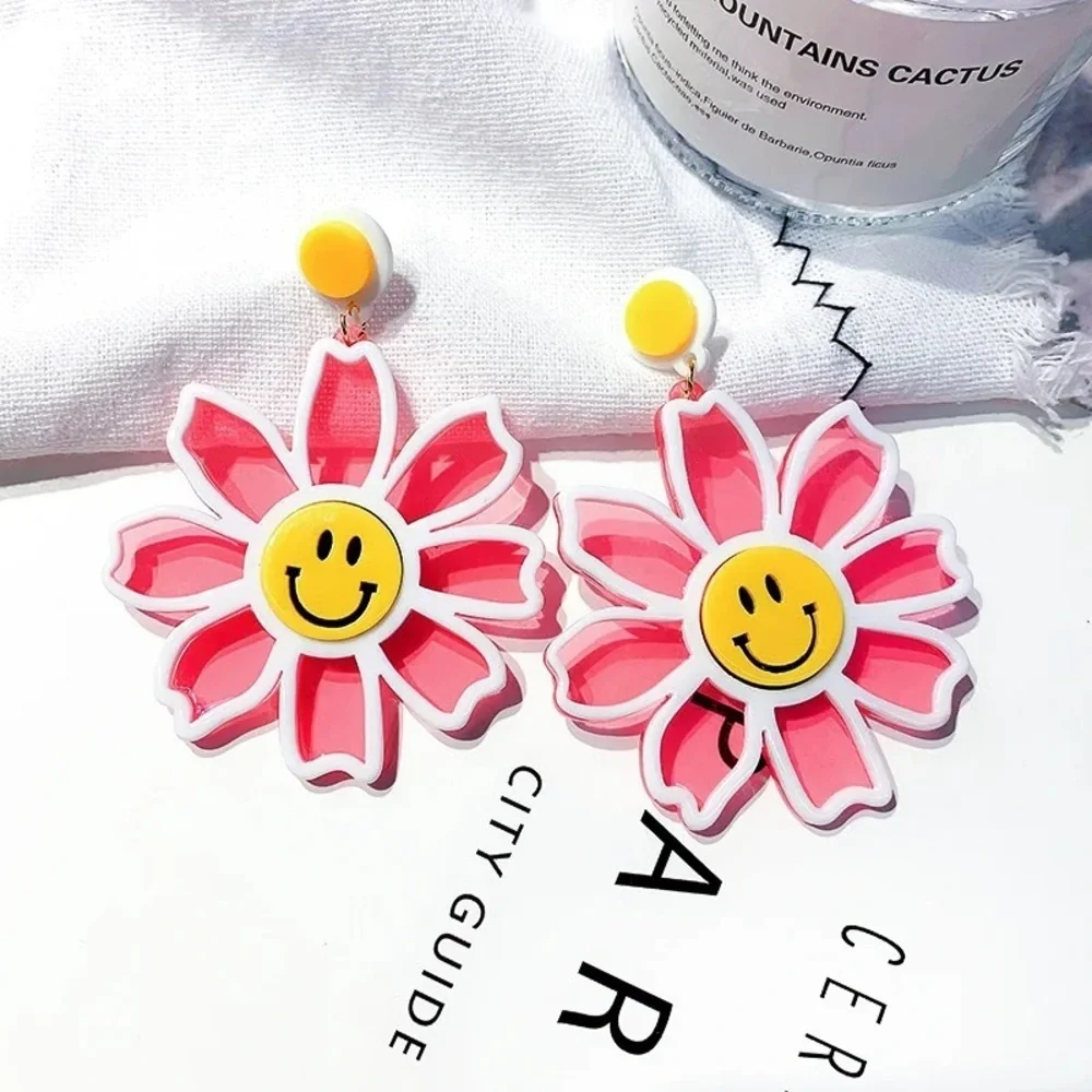 Clear smiley face acrylic flower earrings